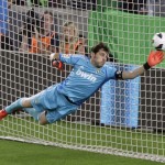 Real Madrid's Casillas fails to make a save as Barcelona's Messi scores his second goal during their Spanish first division soccer match at Nou Camp stadium in Barcelona