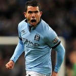 Manchester City 1 -0 Swansea City . Carlos Tevez celebrates his goal.