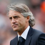 Roberto Mancini concedes Manchester City need a miracle to progress in the Champions League.