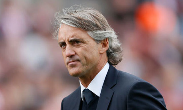 Roberto Mancini concedes Manchester City need a miracle to progress in the Champions League.
