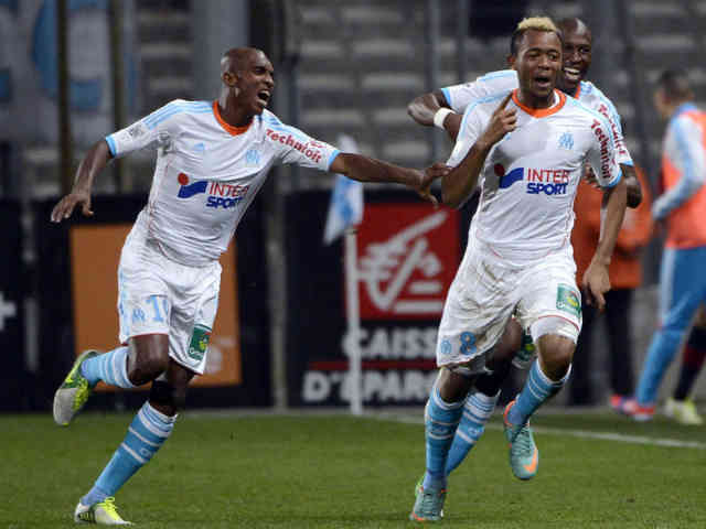 Jordan Ayew scored as Olympique Marseille beat 10-man Lille 1-0 to move level on points with Ligue 1 leaders Paris St Germain
