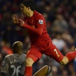 Luis Suarez celebrates his goal as he carries Liverpool to victory