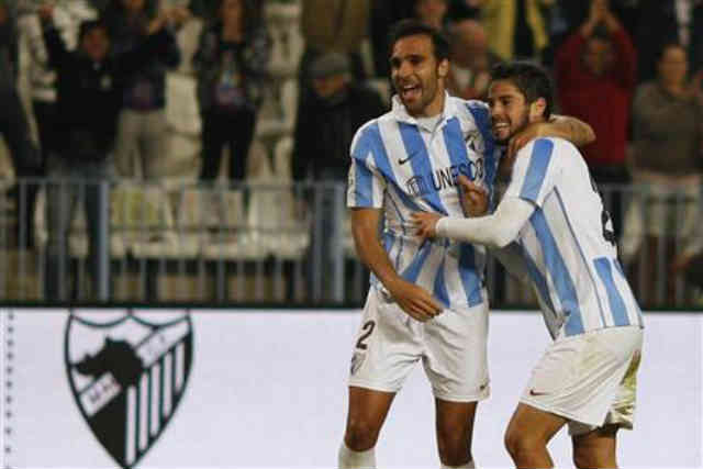 Malaga returned to winning ways as they saw off a desperately poor Valencia