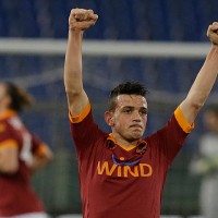 AS Roma's Alessandro Florenzi celebrates after scoring during the Italian cup first leg semifinal soccer match between AS Roma and Inter of Milan in Rome