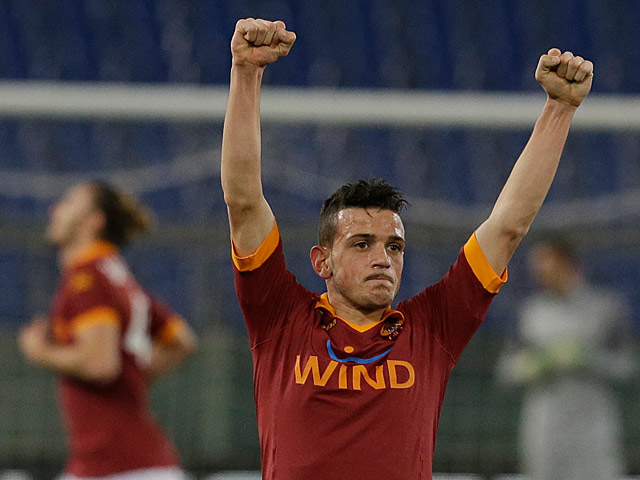 AS Roma's Alessandro Florenzi celebrates after scoring during the Italian cup first leg semifinal soccer match between AS Roma and Inter of Milan in Rome