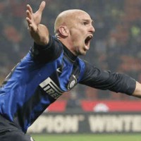 Cambiasso celebrates the second goal for Inter Milan as Torino to hold Inter at the San Siro