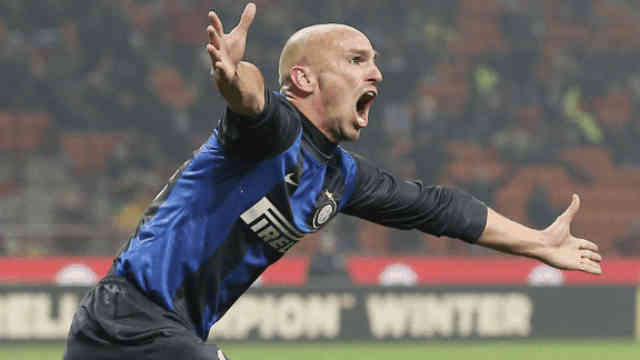 Cambiasso celebrates the second goal for Inter Milan as Torino to hold Inter at the San Siro