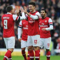 Giroud celebrates his two goals with the Gunners