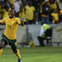 Hosts South Africa finished top of Group A after their dramatic 2-2 draw with Morocco in Durban knocked the North Africans out of the African Cup