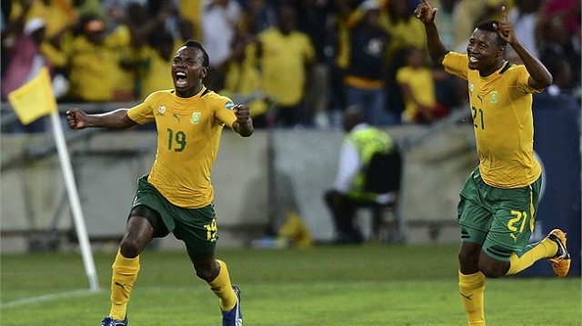 Hosts South Africa finished top of Group A after their dramatic 2-2 draw with Morocco in Durban knocked the North Africans out of the African Cup