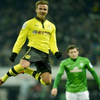 Mario Gotze celebrates his goal as Dortmund win with a landslide