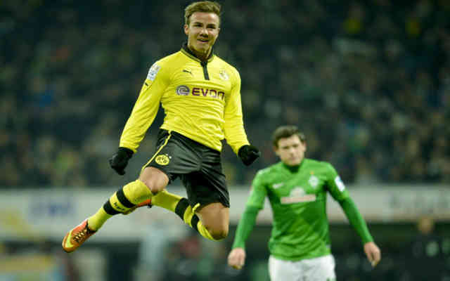 Mario Gotze celebrates his goal as Dortmund win with a landslide