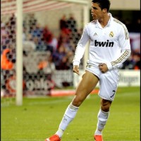 Cristiano Ronaldo showing his right leg muscles after scoring a goal in Atletico Madrid vs Real Madrid.