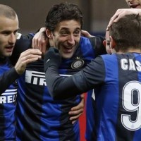 FC Internazionale Milano won 3-1 against AC Chievo Verona to move into fourth place in Serie A at the expense of city rivals AC Milan