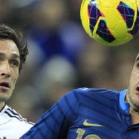 Germany registered their first win over France in 26 years with goals from Thomas Müller and Sami Khedira in an entertaining 2-1 win at the Stade de France.