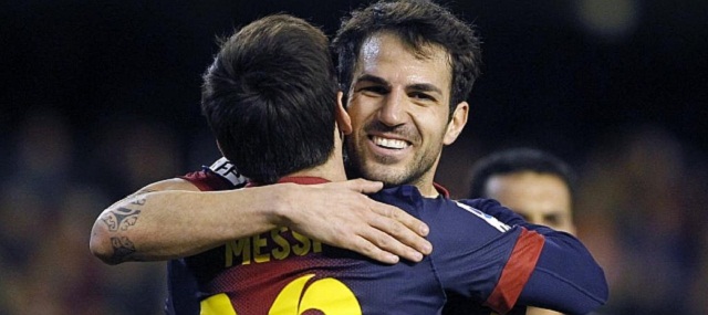 Leo Messi's penalty against Valencia put him just three short of the 300 mark for Barcelona- here we can see Cesc fabregas congratulating him.