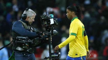 Ronaldinho taken of the pitch as he misses that penalty that could of changed their game against England