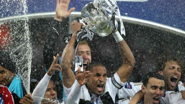 Swansea celebrate their victory and lifting the trophy of the Capital One Cup
