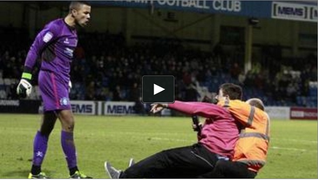 Wycombe goalkeeper Jordan Archer attacked by fan strongly confronts him