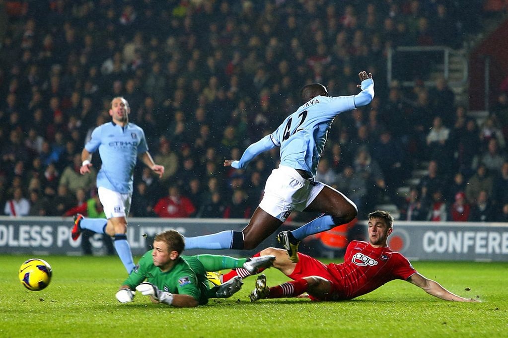 Manchester City 's Joe Hart and Yaya Toure can't stop Southampton scoring.