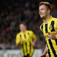 Borussia Dortmund cruised into the quarter-finals of the Champions League with an eye-catching 3-0 win over Shakhtar Donetsk.