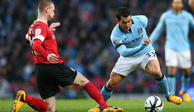 Carlos Tevez brings his game up and gets his hat trick