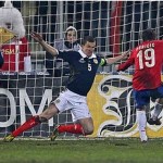 Filip Djuricic, right, scores Serbia's opening goal after Scotland's defence failed to deal with a low cross into the box.