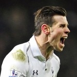 Gareth Bale and Aaron Lennon punished the Arsenal defence to give Tottenham a seven-point lead over their rivals after a 2-1 victory.