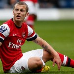 Jack Wilshere will miss the Champions League clash against Bayern Munich tomorrow because of an ankle injury.