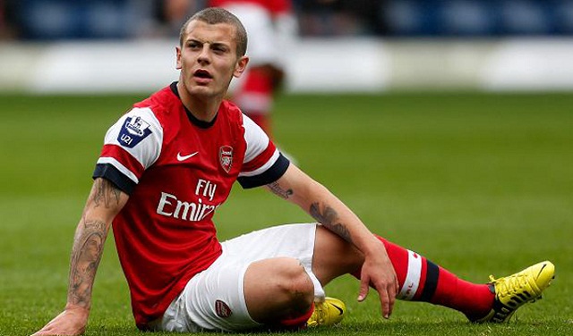 Jack Wilshere will miss the Champions League clash against Bayern Munich tomorrow because of an ankle injury.