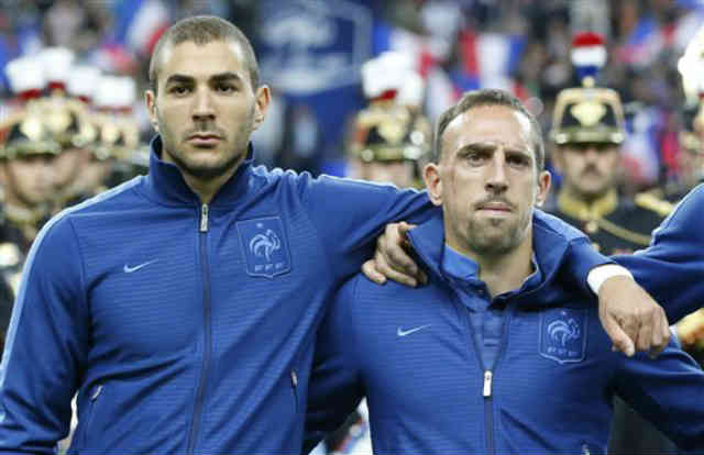 Karim Benzema and Franck Ribery stand to together as a team for France