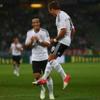 Ozil and Gotze celebrate for their win