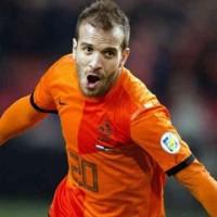 Van der Vaart celebrates his goal for Holland