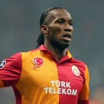 Didier Drogba's Galatasaray beat Schalke 04, 3-2, to advance to the Champions League quarterfinals with a 4-3 victory on aggregate.l