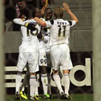 Webo celeberates with his team mates in the Europa League play off