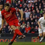 Liverpool's Steven Gerrard scores from penalty spot to sink Spurs