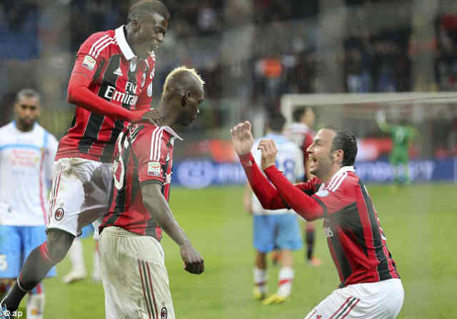 AC Milan team mates celebrate with Balotelli goal