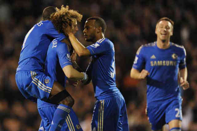 Chelsea celebrates with David Luiz for his goal