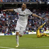 Karim Benzema celebrates the second goal he made for Real Madrid