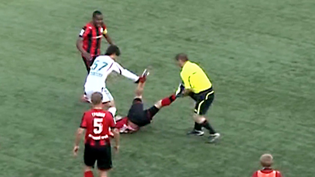 Linesman attacks football player in Russia