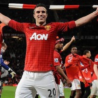 Manchester United's Robin van Persie celebrates winning the EPL title