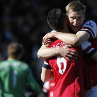 Mertesacker celebrates his goal that gave victory for Arsenal