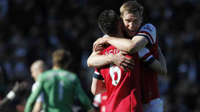 Mertesacker celebrates his goal that gave victory for Arsenal