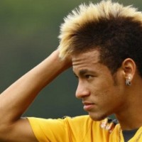 Neymar is trying but really, it doesn't work. Please cut that stupid mohican of yours.