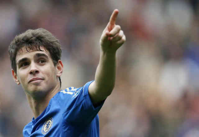 Oscar looks up with joy as he scores his goal giving Chelsea the open to win