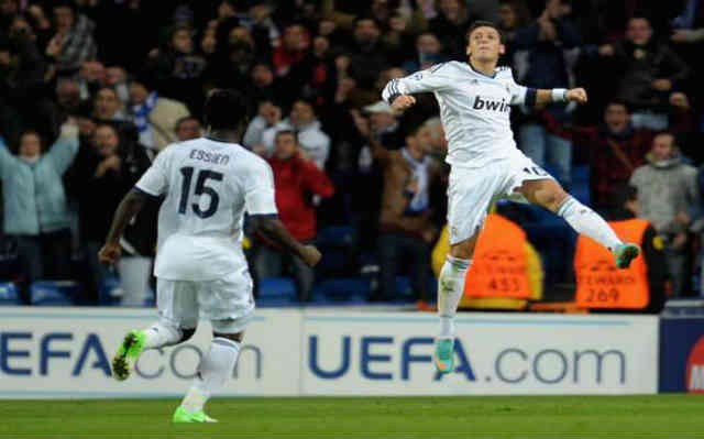 Ozil celebrates his two goals with Madrid