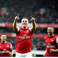 Podolski celebrates his goal which brings the Gunners on a rise