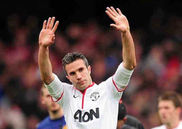 Robin Van Persie does not celebrate his goal as he gives respect for Arsenal