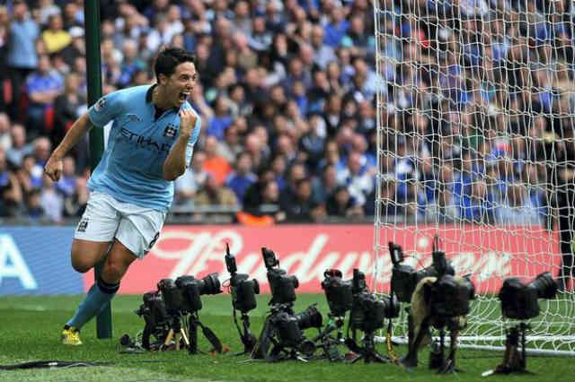 Samir Nasri celebrates the open goal for Manchester City