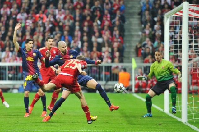 Thomas Mueller scores the opening goal for Bayern Munich, he will score another one in this 4-0 victory over Barcelona- he is our Man of the Match